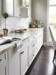 180fx Marks A Revolution In Surfacing With True To Scale Stone Patterns Tha Laminate Countertops White Cabinets Kitchen Countertops White Laminate Countertops