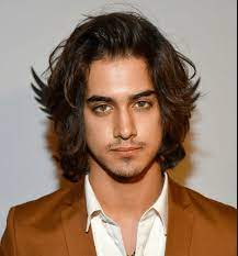 Long Hair Is Trending How To Successfully Grow Your Hair Out Hairstyle On Point Curly Hair Men Long Hair Styles Men Long Hair Styles