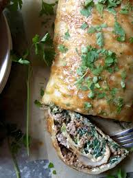 Beef Stuffed Scalloped Potato Roll Recipe Potato Roll Scalloped Potatoes Potatoes