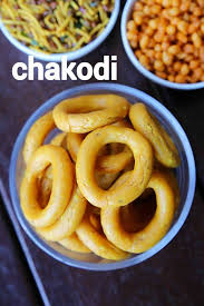 Chegodilu Recipe Chakodi Chekodi Or Kadboli Andhra Ring Murukku Recipe Indian Snack Recipes Indian Dessert Recipes Recipes