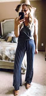Black And White Striped Pants Outfit Black Sleeveless Top And Blue And White Striped Pants Spring Outfits Stripe Jumpsuit Outfit Stripe Pants Outfit Spring Outfits