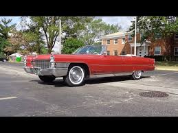 Image result for Starlight Silver 1965 Cadillac