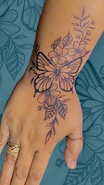 Butterfly with flower vine tattoo done🌸🌹🦋., ., ., ., #butterfly #butterflytattoo #flowers #flowers🌸 #flowertattoo #handtattoo #handtattoos #tattoo #tattoos #realstictattoo #portraittattoo #girltattoo ...