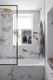 The walls are sheathed in calacatta viola marble. Black And White Bathroom Ideas For A Modern Monochrome Look Marble Bathroom Monochrome Bathroom Color Bathroom Design