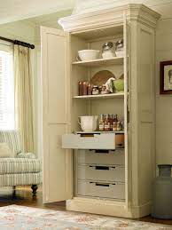We love the down to earth styles and with names like family, who can resist. River House Collection Utility Cabinet With Four Tray Drawers And Two Adjustable Wood Shelves In River Boat Fi Utility Cabinets Paula Deen Furniture Furniture