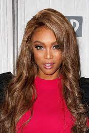 Long combover bangs frame the face on one side, and on the other side the hair is neatly slicked back and tucked behind the ear, leaving an angled piece pointing towards the chin. 50 Cute Long Layered Hairstyles And Haircut Trends For Women 2021