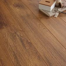 Arpeggio Tuscany Olive Effect 2 Strip Laminate Flooring 1 85 M Pack Departments Diy At B Q Flooring Laminate Flooring B Q Laminate Flooring