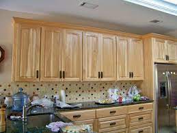 How do you decorate around them? Natural Rustic Pecan Cabinets Stained Kitchen Cabinets Kitchen Cabinets Custom Cabinets