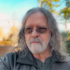 Fret leveled a LP neck. Used a StewMac notched straight edge, and fine  adjusted till it was as straight as I could get. Used a StewMac leveling  beam with 600 paper, following