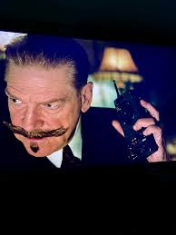 What movie features a device to converse with the afterlife?