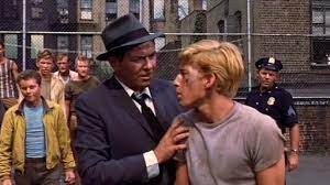 Glad hand (john astin) was one of only four adults featured prominently in west side story (the other three being sergeant krupke, lieutenant schrank and doc), but is the most minor of the four, as his character appeared only in the gym dance scene. West Side Story 1961 Trailer West Side Story Schrank And Krupke Metacritic