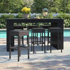 The pub table stands 41.5'' tall, so you can easily sit or stand while you chat over drinks. Deck Bar Table And Chairs Off 67