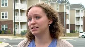 SC woman snaps photo of 'alligator' floating along flooded street
