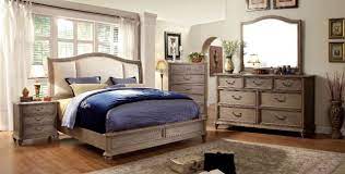 Crafted from solid pine wood, its frame features a slatted design and a weathered finish. Furniture Of America Belgrade Ii 4pc Upholstered Platform Bedroom Set In Rustic Natural Tone And Ivory