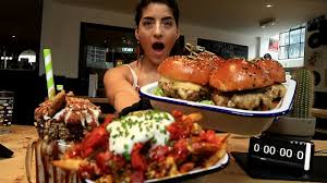 Mrbeast burger is a virtual brand offering a separate concept to run out of your kitchen. Girl Vs Bohns Burger Challenge Four Burger Fries Milkshake Girlvs Food Youtube