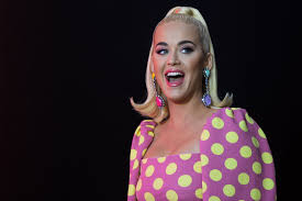 Katy Perry's Toned Abs, Legs, Glow In A Neon, High-Slit Skirt On IG