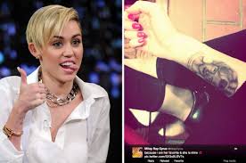 Nov 23, 1992 · a true star in the making, miley cyrus has come a long way from being a disney star to a teenage pop sensation. Who Is This Woman Whose Face Miley Cyrus Tattooed On Her Arm Vanity Fair