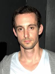 A removable or hinged cover for a hollow receptacle or box. Ivri Lider Wikipedia