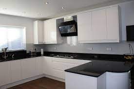 However, white is a classic pairing for a black kitchen, because the monochrome look is powerful yet classic, bold but not scary. White Gloss Handleless Black Quartz Worktop Modern Kitchen Other By Cadbury Kitchens Ltd Houzz