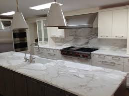 The style is not merely for contemporary spaces (although black stone or maybe corian counters certainly look sophisticated and sleek, particularly when combined with sharp white cabinets). White Kitchen With Black Marble Countertop Novocom Top