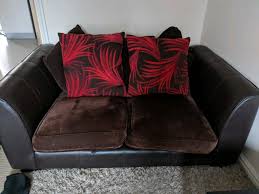 2x brown leather sofas with fabric