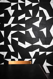 Black And White Puzzle Images La Nueva Coleccion Puzzle De Mutina Realza El Valor De Los Espacios Y Crea Un Nuevo Concepto En Decoracion Geometric Tiles Tile Patterns Modern Mosaics