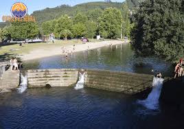 O rio cabrum e toda a envolvente paisagística natural e construída, incluindo os moinhos de água. Praia Fluvial De Burgaes Uma Joia De Aguas Cristalinas