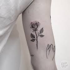 It's a large tattoo but doesn't appear that way as it's an outline. Tattoo Uploaded By Sonny Small Rose On Left Arm 1060967 Tattoodo