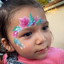 I haven't posted in so long! Im still here, painting and twisting away!  here's a cute little shot form this weekend. 🌷🌸🌷🌸 #facepaint  #facepainter #rosefacepaint #flowerfacepaint #facepaintfun