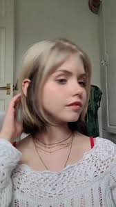 Celebrity with Blonde Hair with Black Underneath