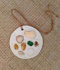 How to make shells out of clay. Activities For Kids The Mosaic Made From Air Dry Clay Little Stones And Sea Shells Air Dry Clay Kids Clay Seashell Crafts