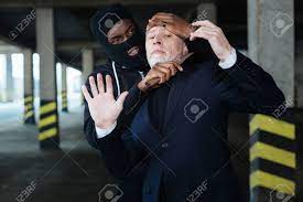 Aggressive Ruthless Criminal Killing A Man Stock Photo, Picture and Royalty  Free Image. Image 75263769.