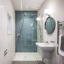 Tile floors allow for heated flooring systems that warm your feet while you're in the bathroom. Small Quirky Bathroom Design With Seamless Double Shower Hexagonal Wall Tiles Herringbone Wall Til Small Bathroom Tiles Small Bathroom Remodel Bathroom Decor