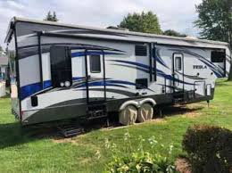 Tesla fifth wheel toy hauler. Evergreen Rv Tesla 3212 37 Toy Hauler Fifth Wheel Generator Vans Suvs And Trucks Cars