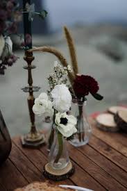 Photo by shannon duggan photography and centerpiece by mollie young. Winter Wedding Flower Centerpiece With Ranunculus Weddingtales Gr