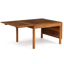 Take a look at the following pop up coffee table designs. Mogensen Borge Coffee Table Of Nut Wood With Two Flip Up Leaves Mutualart