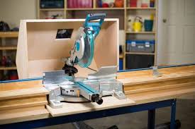 Tame Sawdust With One Of These Miter Saw Dust Collection Ideas Whether You Buy Or Diy Your Workshop Will Be C Mitre Saw Dust Collection Miter Saw Woodworking