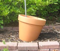 How To Make A Crooked Terra Cotta Pot Flower Tower With Annuals Dengarden Home And Garden However, should not be watered where standing.