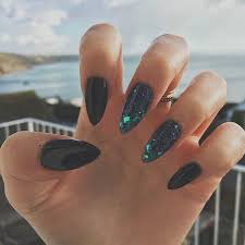 Black And Teal Stiletto Nails Black Stiletto Nails With Turquoise Glitter Encapsulation Nails Nailart Sparklenails Naildesigns Re Pinned By Brea Almond Nails Cute Nails Trendy Nails