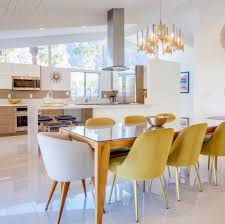 Our Anderson Expandable Dining Table Paired With Our Mid Century Dining Chair In Wasabi West Elm Living Room Mid Century Living Room Mid Century Dining Chairs