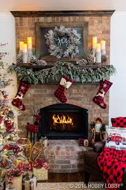 Cozy Cabin Charm Meets Traditional Holiday By Coupling Warm And Rustic Accent Pieces With Christmas Mantle Decor Christmas Fireplace Decor Christmas Fireplace
