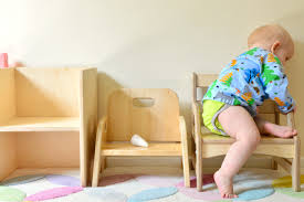 Childrens tables and chairs are designed to suit little ones, with lower table tops, smaller seats and shorter legs. All About Chairs Comparing The Cube Chair Me Do It Chair Montessori Weaning Chair How We Montessori