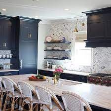 In 2020, we've started to see white kitchens using darker moodier accent colors. Navy Kitchen Island Contemporary Kitchen Benjamin Moore Hale Navy Sealy Design