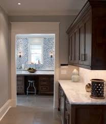 Brown Cabinets Espresso Cabinets Crown Moulding Marble Countertops Grey Walls Millwork Brown Cabinets Espresso Cabinets Dark Wood Kitchen Cabinets