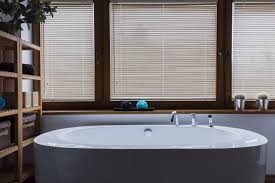 On narrow bathroom windows, the shades drape in a single swag, whereas wider windows typically have two or more swags. Best Blinds For Bathrooms Moisture Resistant Window Treatments