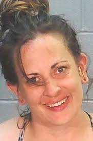 Woman charged in bizarre stolen convertible chase