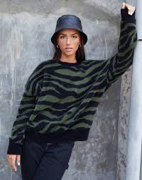 Features our bold planet graphic in contrast colour, and seam detailing along the armhole and side seams. Black And Green Zebra Oversize Jumper Eleni Motelrocks Com