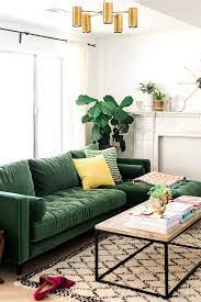 A green sofa is not everyone's cup of tea but it can make a living room furniture set look bold and stylish. Crushing On Green Seating Green Sofa Living Living Room Green Living Room Designs