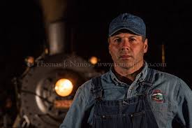 Wayne poses for the portrait session at the end of…