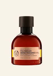 Monoi oil can also help nourish the scalp and hair. Polynesian Monoi Radiance Oil The Body Shop